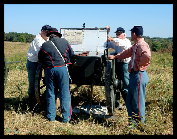 Union artillerymen check their fuses and shells before the battle of Perryville, Kentucky reenactment, 2016