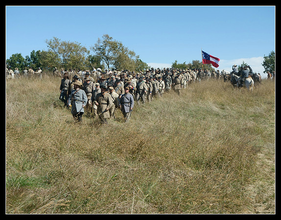 Confederate infantry unit advancing to fight at the battle of Perryville, Kentucky reenactment, 2016